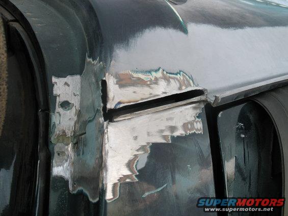 img_2328.jpg cut a slot in the sheet metal where the horizontal joint is visible