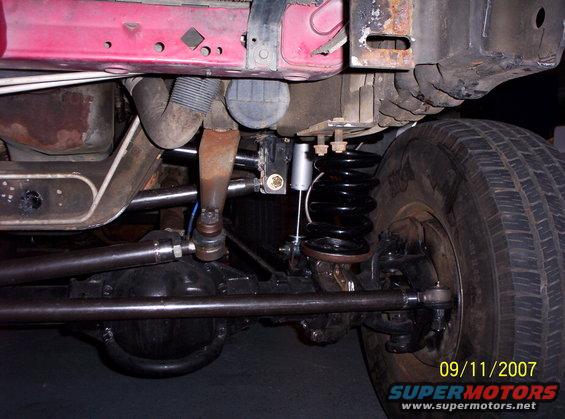 Red vehicle frame with suspension and tire visible. Date stamp reads 09/11/2007