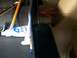 1995 Mercury Grand Marquis - Interior trim piece with tools and adhesive, likely part of a repair or modification.