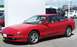 1996 Ford Probe - Red 1996 Ford Probe GT with a spoiler and GT badging on the side.