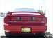 1996 Ford Probe - Rear view of a red 1996 Ford Probe GT, showing the taillights, spoiler, and GT badging.