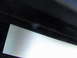 1977 Ford Mustang - Interior trim panel with brushed metal insert and black textured material. Supermotors.net logo visible.