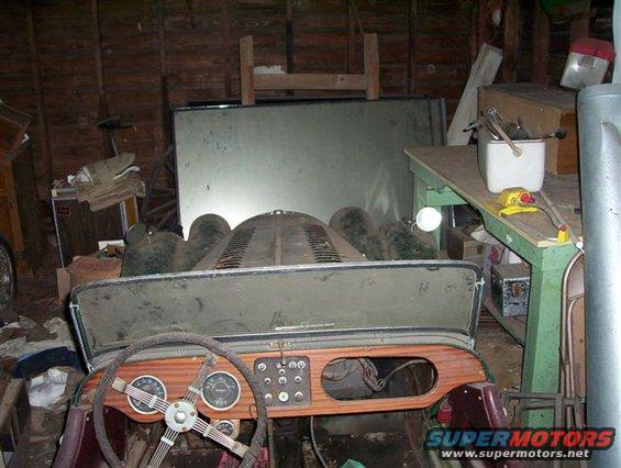1964 Morgan 4/4 interior with wood-grain dashboard and two gauges