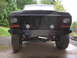 1979 Ford Bronco - Custom bumper and headlights on a black Ford Bronco. The grille suggests a 1978 model year.