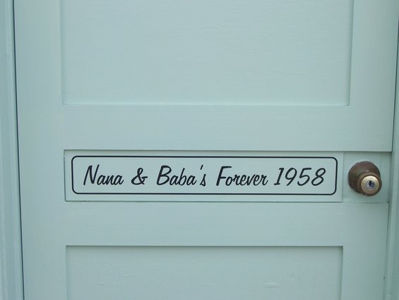 Door with plaque that says 'Nana & Baba's Forever 1958'