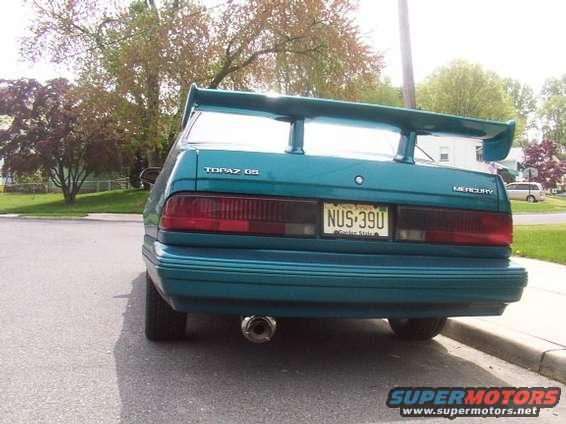 rmuff.jpg New Muffler to go with the 2.5" piping.