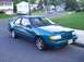 1994 Mercury Topaz - Angle shot, after good cleaning. If ya remember it had a Mercury grille, but I had an accident so the front end is enti…