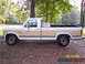 1970 Mercury Cougar - This pickup truck has a two-tone paint scheme and a toolbox mounted in the bed.