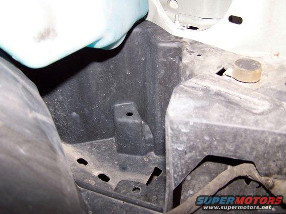 Area directly below airbox
Cutting this would theoretically allow access, via tubing, to air from in front of the tire/behind bumper