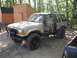 1979 Ford Bronco - Modified 1989 Ford Bronco II with off-road modifications parked outdoors.