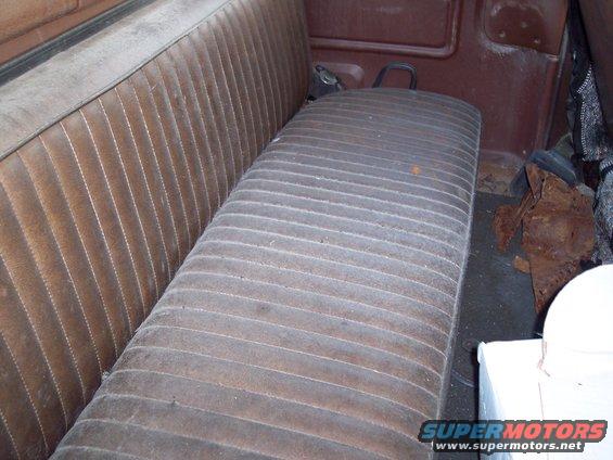 Brown vinyl bench seat interior with ribbed pattern