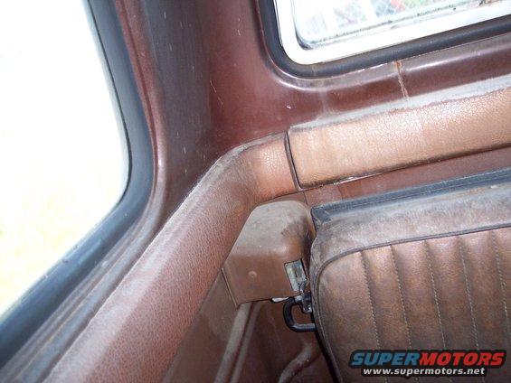 Close-up of brown interior trim and seat in a truck
