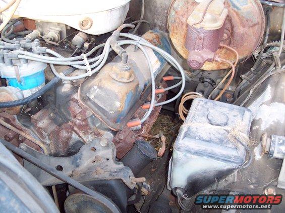 1978 Ford F-250 engine bay with visible rust and wear