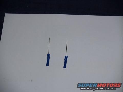 _9173441.jpg These are back probes I made out of sewing needles & electrical connectors to make it easier to run Voltmeter tests on my sensors & injectors. These probes stay in place and the volt meter probes plug into them. 