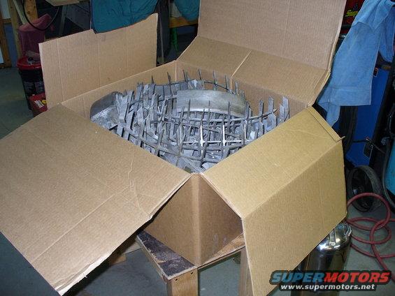 H1 rims in a cardboard box