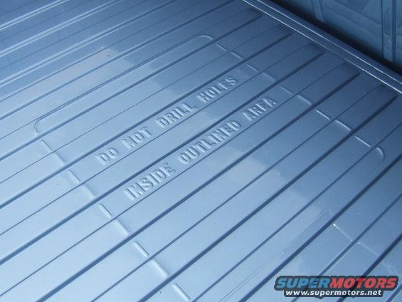 Bed above fuel tank