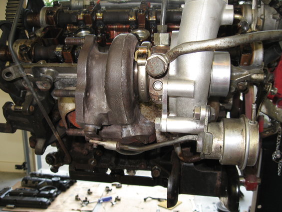 Engine with turbocharger and associated plumbing