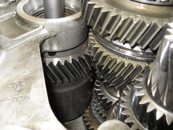 Close-up of metal gears inside a transmission