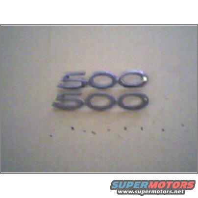 Two chrome '500' emblems, one above the other