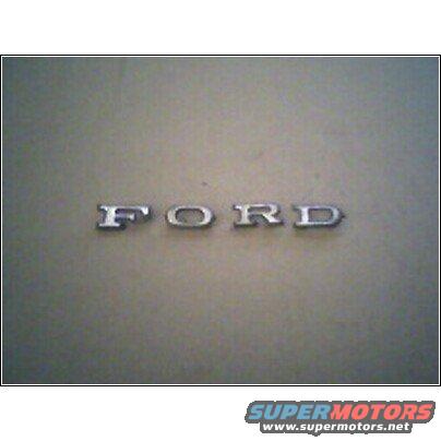 Chrome Ford emblem on a textured surface