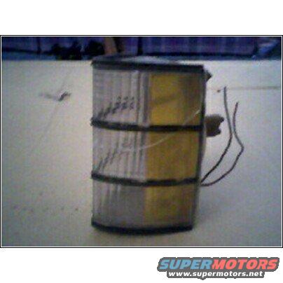car turn signal assembly with clear and amber sections and wires