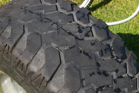 Close-up of a tire with a geometric tread pattern