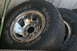 1986 Ford Bronco - Close-up of multiple Wild Country Radial RVT tires with chrome wheels.