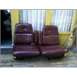 1973 Ford Ranchero - Pair of maroon car seats, likely from a vintage vehicle, are shown with a center console in between.