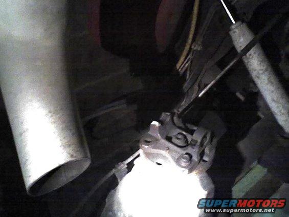 Exhaust pipe and suspension parts of a vehicle