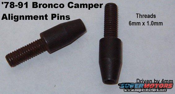 camperpins.jpg These spikes screw into '78-91 Bronco bedrails & are removeable to prevent injury when the top is off & passengers are in the back.  Later Broncos have the pins permanently attached to the camper shell, with slots in the bedrails.