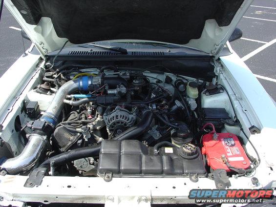 1999 Ford Mustang engine bay with aftermarket intake