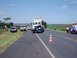 1987 Ford Thunderbird - Emergency responders at a multi-vehicle accident scene on a highway.