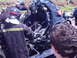 1987 Ford Thunderbird - Firefighters work at the scene of a severe car accident.