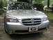 2002 Nissan Maxima - Front view of a silver 2002 Nissan Maxima with a Georgia Bulldogs license plate.
