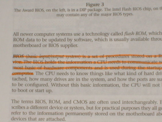 Document page with text about computer BIOS and flash ROM, with orange highlighting