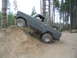 1989 Ford Bronco - This 1979 Ford F-Series truck is navigating a challenging off-road trail.