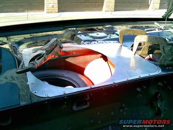 the deck was too irregular to mount the passenger side sub. here the patch panel is clamped and popping in.