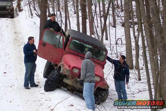 100_0053a.jpg Ken pointing to where the trail is