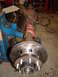 1989 Ford Bronco - Close-up of a rear axle assembly, likely for a truck or SUV, with disc brakes.