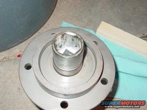 Wheel hub with a socket wrench fitting inside