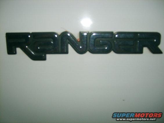 Black Ranger emblem on a white surface