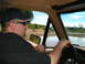 1989 Ford Bronco - Driver navigates an off-road water obstacle in a vintage SUV.