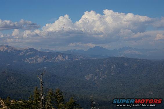 Looking North across the Ansel Adams wilderness. The dark jagged mountains in the background are part of the Minarets range