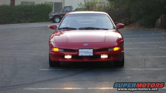 Red 1996 Ford Probe front view with license plate visible