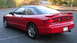 1996 Ford Probe - The rear of a red 1996 Ford Probe GT is shown, a spoiler and a license plate.