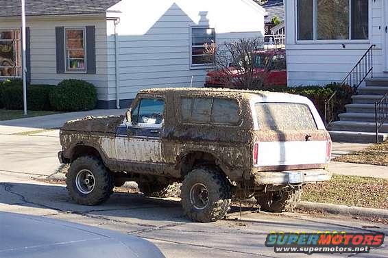 Mud-covered 1978 Ford Bronco, 3q-front view