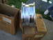 1966 Ford Mustang - A single chrome wheel is shown, resting on top of two cardboard boxes. Text on the boxes indicates 'Specialty Wheels Ltd.'