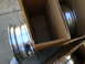 1966 Ford Mustang - New chrome wheels are packed in cardboard boxes, ready for installation.