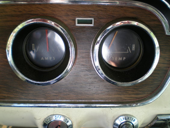 1966 Ford Mustang interior gauges showing amps and temperature