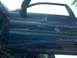 1978 Ford Bronco - Airbrushed artwork on a vehicle door depicts a naval fleet with an aircraft carrier and fighter jet.